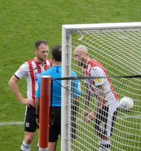 Jake Taylor and Nicky in discussion with the referee in the Forest Green game